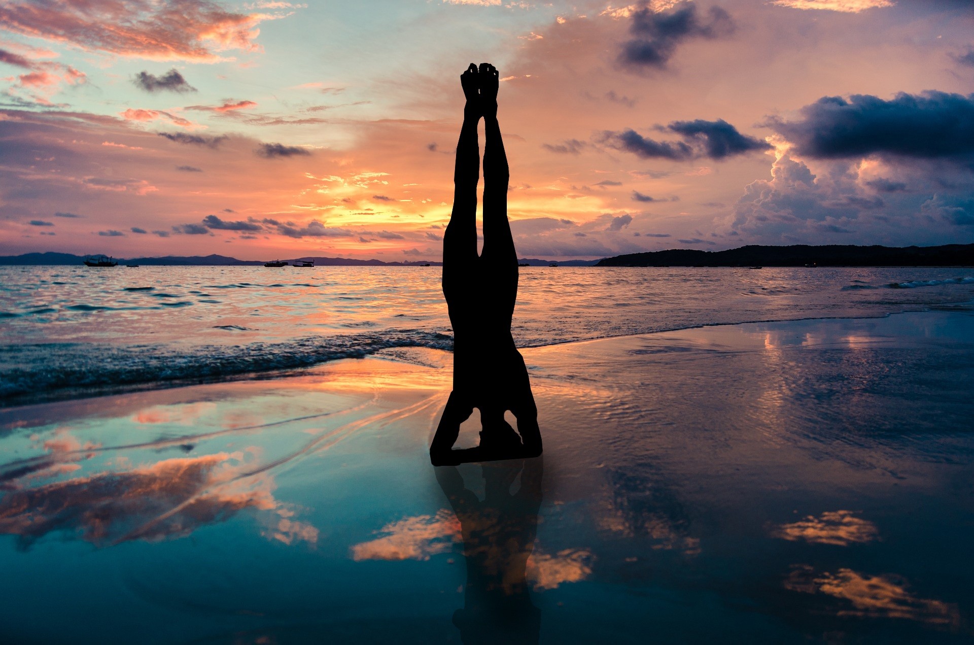 Silhouette of person in a headstand on the beach at sunset.

Look at life from a different perspective.